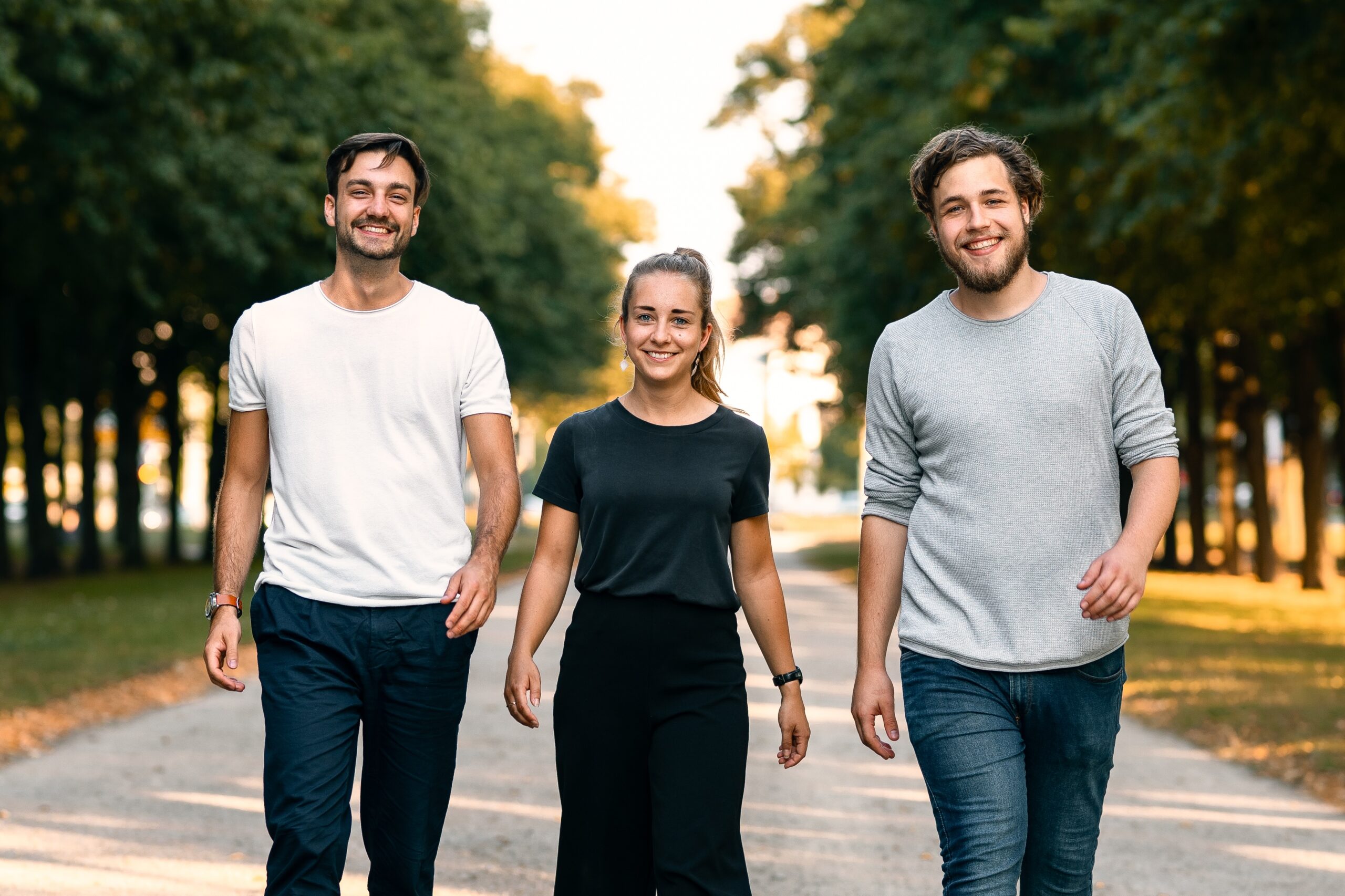 Team smiling and walking